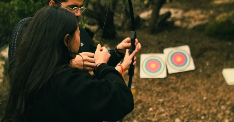 Fartlek Training - A man and woman are shooting arrows at a target