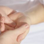 Massage Therapy - Person Holding Hand