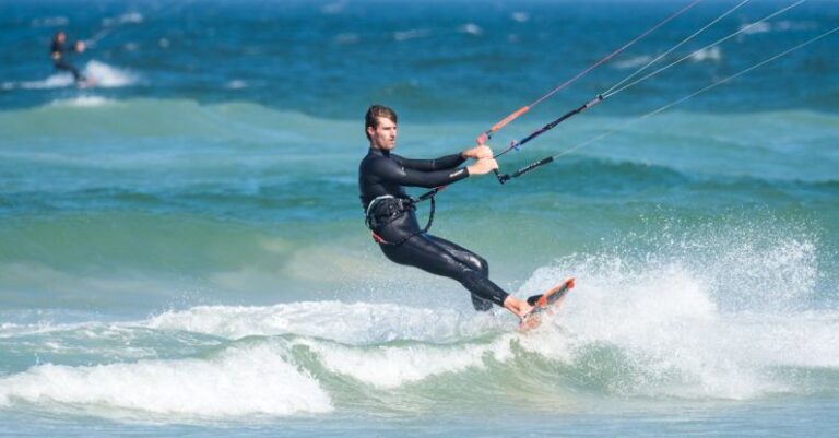 Wetsuit - Man Parasailing While Wearing Wetsuit