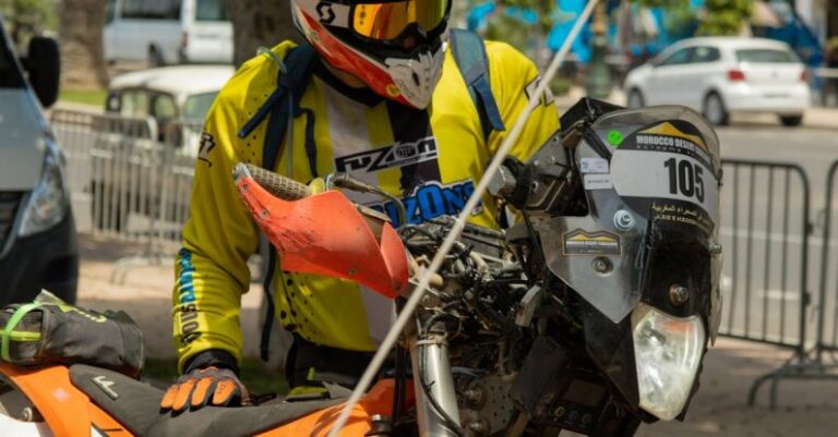 Compression Gear - rider holding his orange motocross