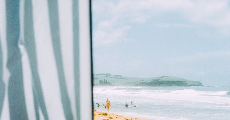 Swimming Tactics - a view of the beach from under the cabana