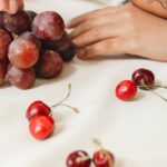 Race Nutrition - Portrait of a Woman with Red Fruits