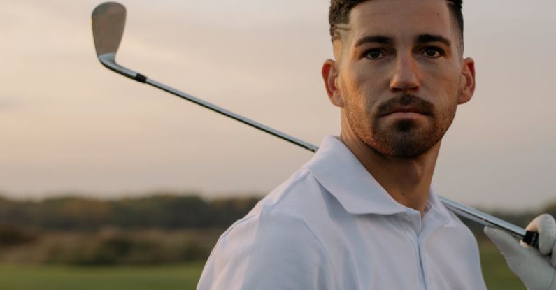 Course Profile - Handsome Man in White Polo Shirt Holding Golf Club