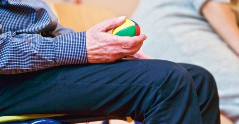 Physical Therapy - Person Holding Multicolored Ball