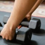 Strengthening Techniques - Person Holding Black Dumbbells