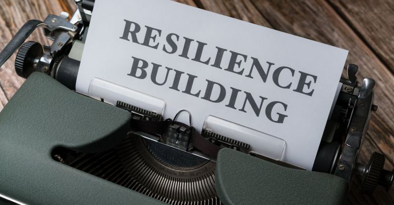 Mental Toughness - A typewriter with the word resilience building on it