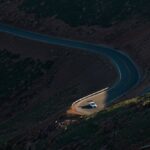 Race Day Anxiety - Aerial View of Road in the Middle of Green Trees