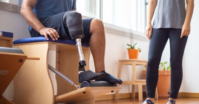 Active Recovery - A Sitting Man Rehabilitating with a Prosthetic Leg